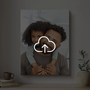 Canvas print of a father and son embracing on a wall with a cloud icon overlay.
