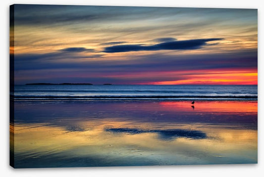 Sunset beach reflections