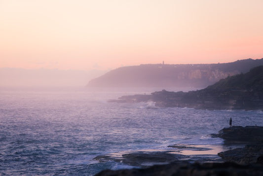 Lone rock fisherman