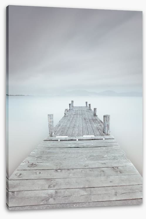 Pier on the frozen lake