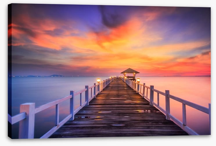Fiery sunset across the pier