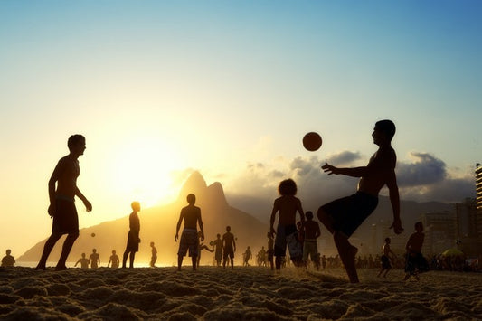 Beach football at sunset, Brazil