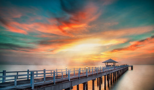 Dramatic pier sunset