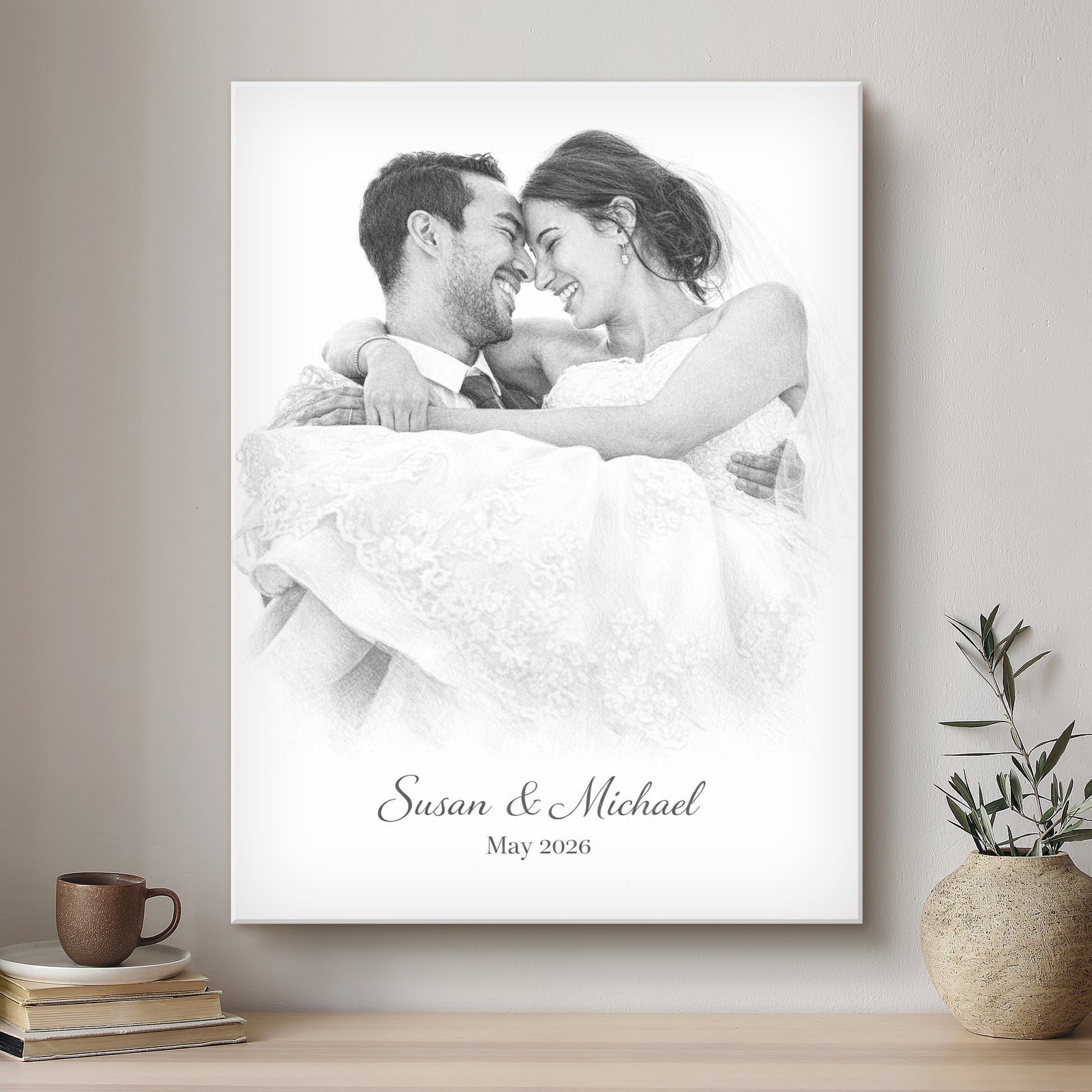 Framed black and white portrait of a couple with personalized text on a wall above a wooden surface.