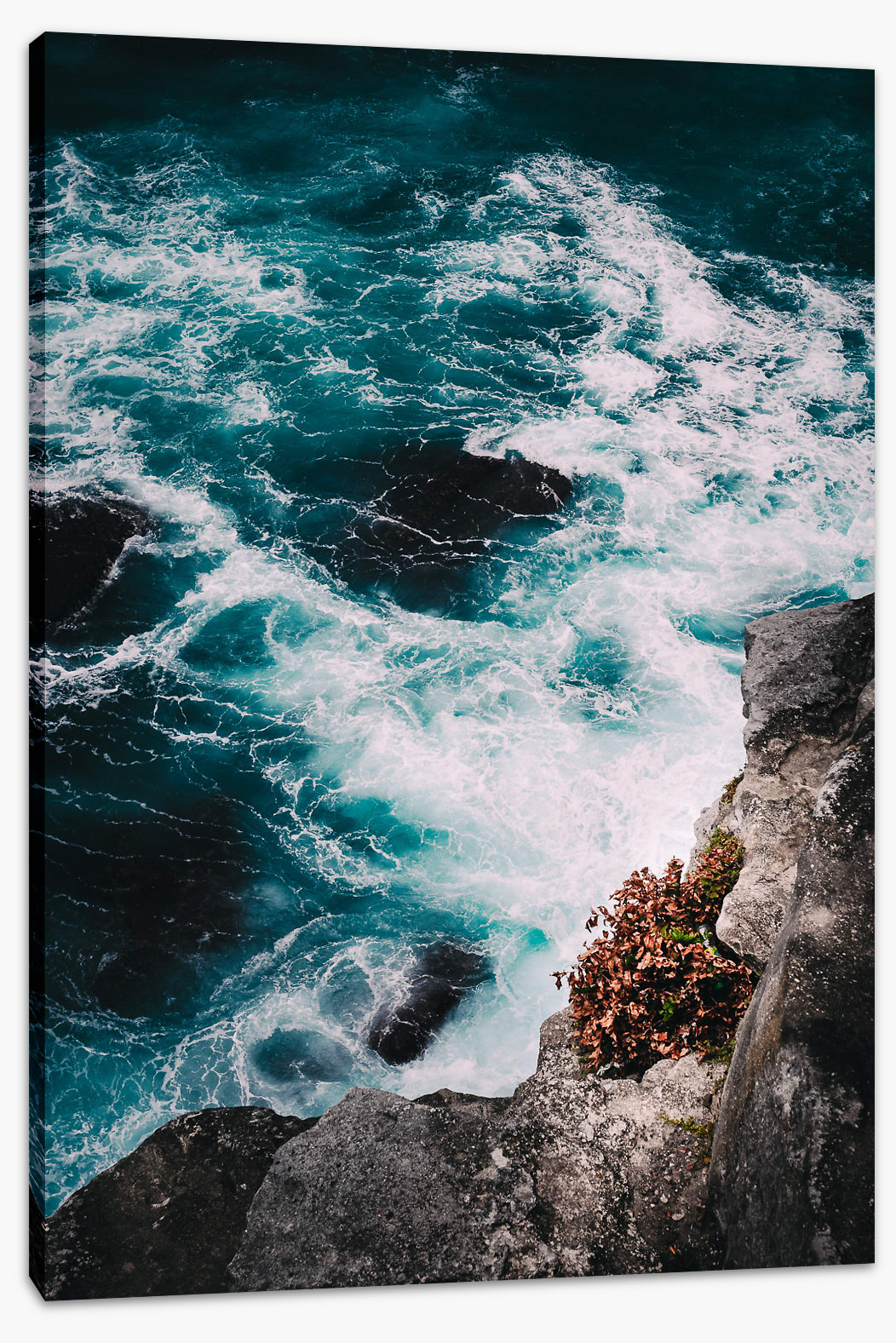 Below the ocean cliff